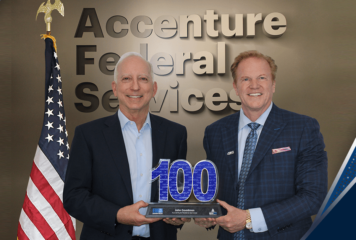 John Goodman of Accenture Federal Services Accepts 2024 Wash100 Award From Jim Garrettson of Executive Mosaic